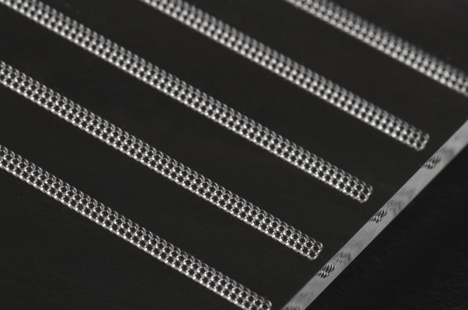 Micro-precision molded features at high magnification